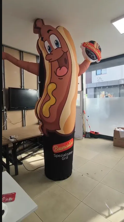 Baumeister Spezialitäten Grill — Mascota de producto hot dog